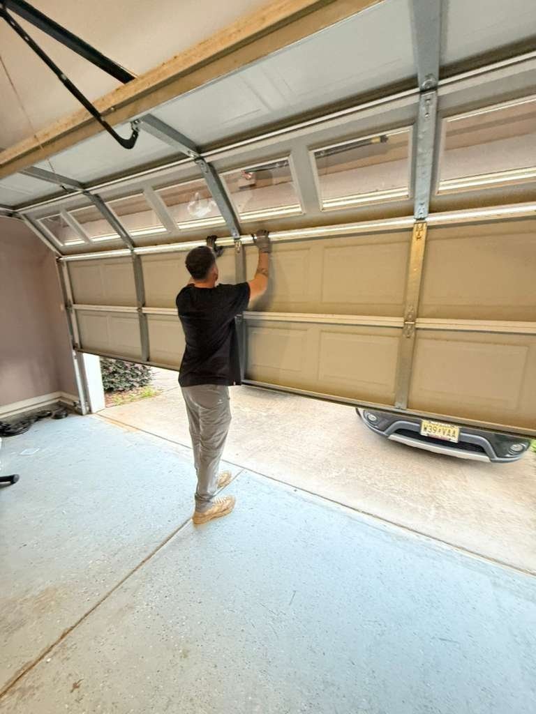 Garage Door Panel Replacement work on a garage door