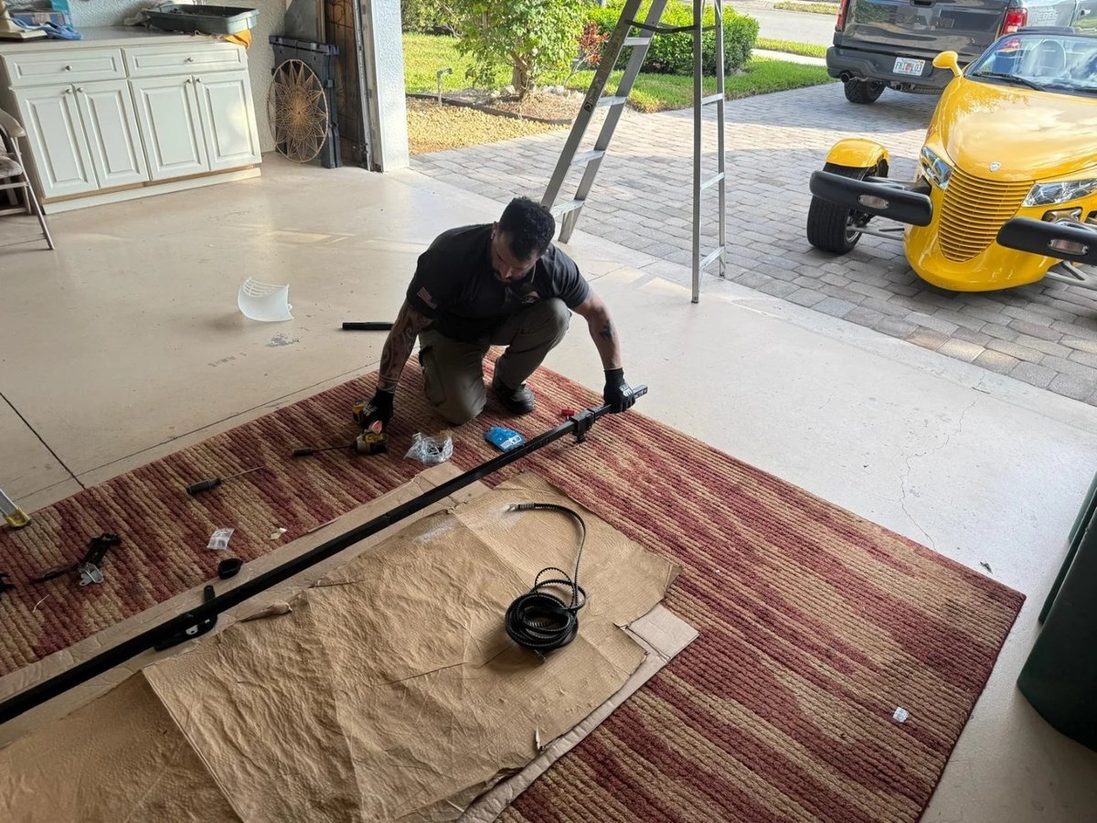 A Scenic of Mack technician on a job in Santa Rosa Beach