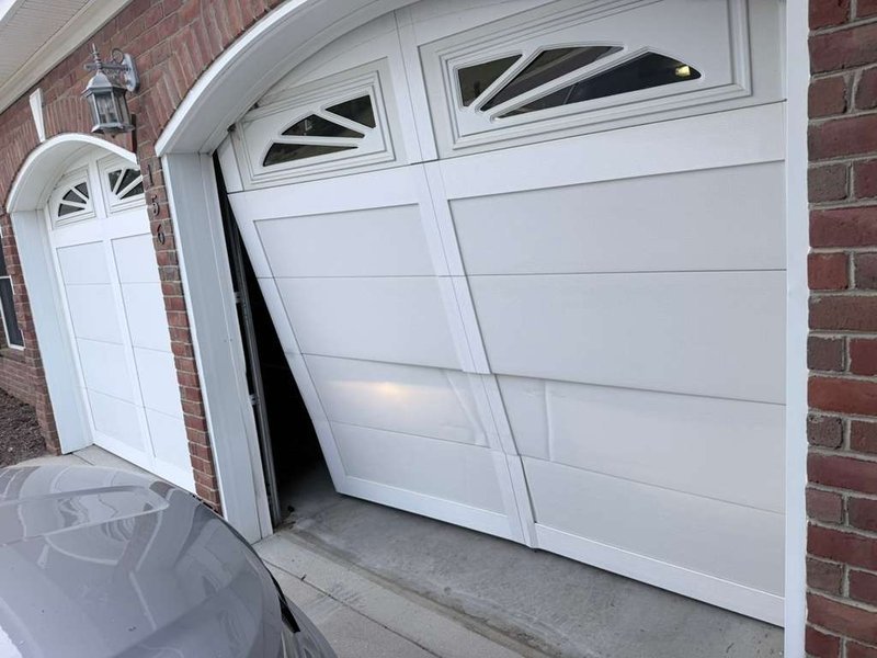 Off-Track Garage Door Repair by Scenic of Mack